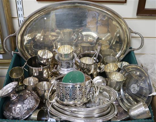 A collection of plated items, including a large oval two-handled tray,